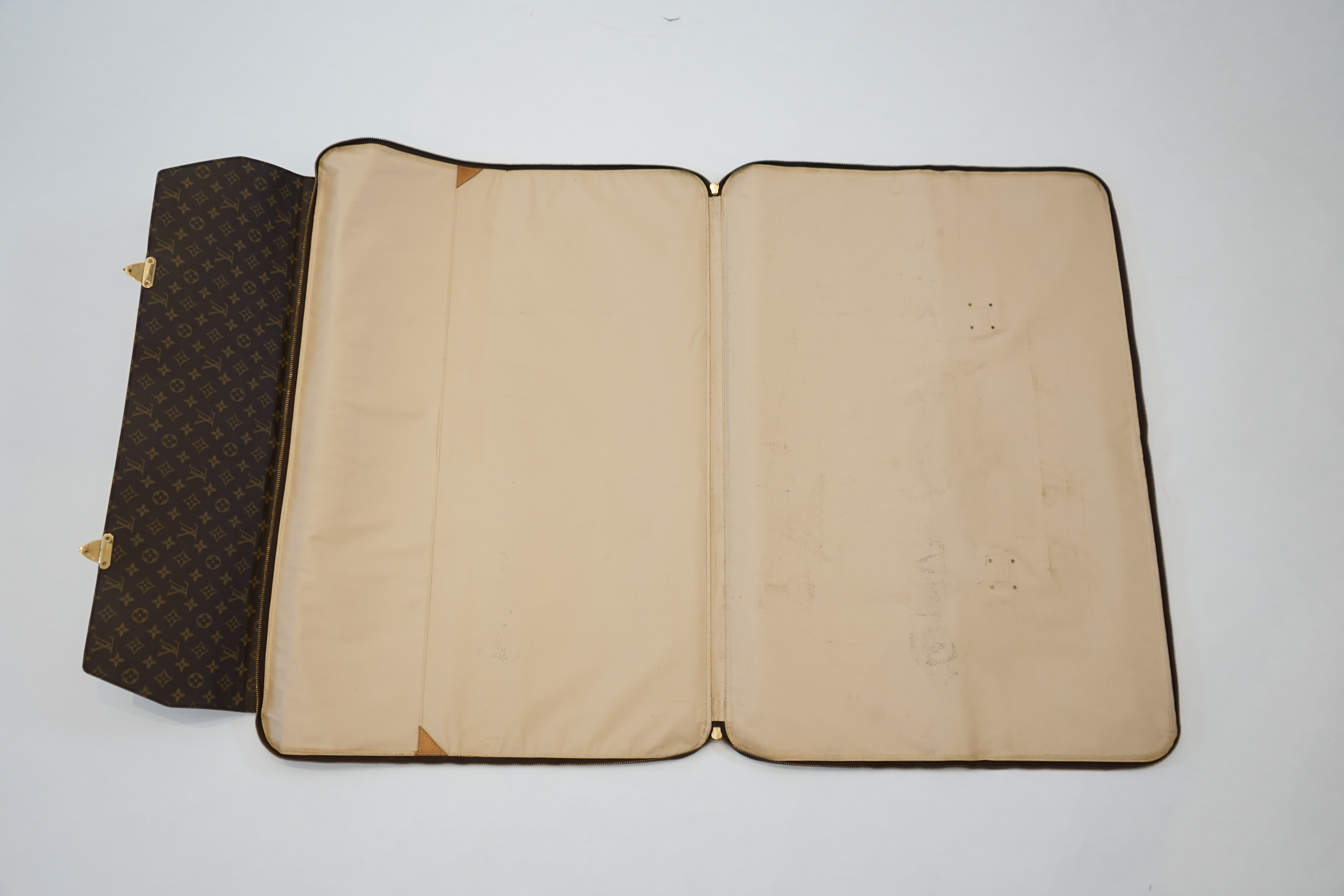 A Louis Vuitton special order folio case width 90cm, depth 4cm, height 63cm